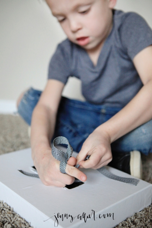 Teach your child to learn to tie shoes with this easy DIY shoelace box.